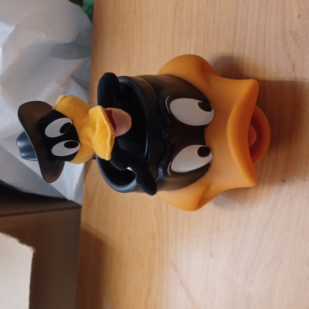 Looney tunes Daffy duck mug and character.